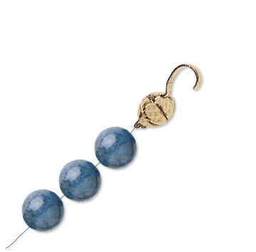 A strand of beads with a closed bead tip at the end of it.